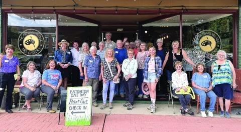 Attendees of the 8th annual Paint Out pose in front of the Artisan Village Guild. (CONTRIBUTED)