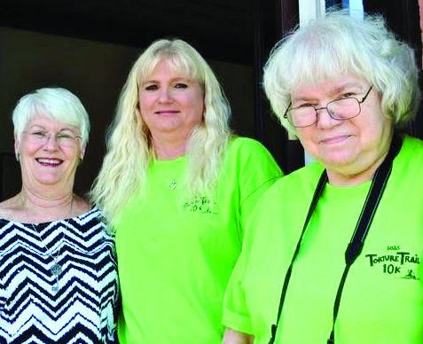 JoAnn Smith (l-r), Cassandra Fowler and Becky Meyer in front of The Messenger office. CONTRIBUTED