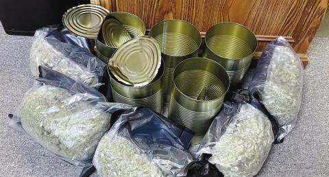 Local authorities intercepted a FedEx package containing medical grade marijuana sent to Eatonton from California last week. Two men were arrested. CONTRIBUTED/PCSO