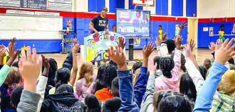 Stanley Tucker selects two contestants from the crowd. COURTESY OF PCES