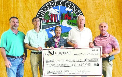 Present for the Firefly Trail Inc. check presentation were (L-R): Greene County Manager Byron Lombard, Firefly Trail Development Coordinator John Kissane, PTI Board Member Lisa Baynes, Woodville Mayor Phil Brock, and Greene County Commission Chair Gary Ursy. CONTRIBUTED