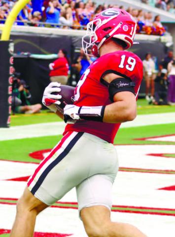 Bowers (19) grosses the goal line against Florida. BRENDAN KOERNER/Staff
