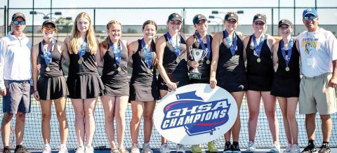 The Lake Oconee Academy Lady Titans and their coaches pose for a photo after capturing the program’s first state title. They defeated Telfair County this past Saturday to win it all. CONTRIBUTED