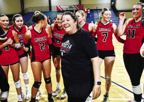 Kathleen Goodwin celebrated with her players after they defeated the Savannah Arts Academy to win the Class 2A state title last November CHARLES JORDAN/File Photo