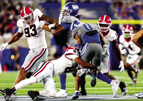 The defense kept Georgia in the game despite being short-handed. Tyrion Ingram-Dawkins (93) recorded two tackles for loss and a sack. Joenel Aguero (8) recorded three solo tackles. CONOR DILLON/UGAAA