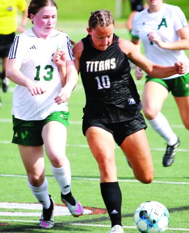 Lady Titans' senior Jane Monachello scored her team's only goal in Tuesday's championship match. (BRAD HARRISON/Staff)