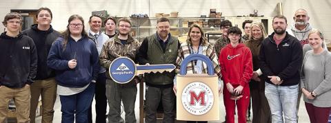 L-R: Daniel Whitten, Jack Morris, Dominic Baxter, Engineering Instructor Brian Johnson, Seth Mullins, Ben Jarrell, Georgia-Pacific Mill Manager Wesley Stone, CTAE Director Jennifer Butler, Tanner Somogy, Markus Mann, Michael Stewart, Principal Melanie Sigler, GP Human Resource Ashby Smith, Coach Greg Thompson, and Ag Mechanics Instructor Briana Stoops. CONTRIBUTED
