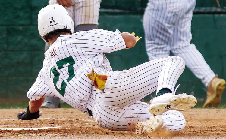 Jackson Hewatt (27) reaches for home plate to score for Gatewood against Westwood last Friday evening. (TREY NORRIS/Staff)
