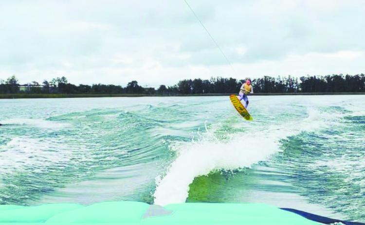 Ana glides through the air while wakeboarding. CONTRIBUTED