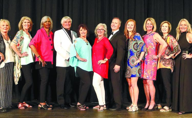 Following the fashion show, models, presenters and organizers gathered on stage from l-r: Ashley Culberson, Lisa Hanscom, Diana Arendt, Juleen DuBois, Josephine Giles, Rick Franks, Suzanne Ramsey, Melinda Spivey, Dr. Jay Spivey, Sarah Spivey, Charlotte Mosteller, Charlotte Engel, Tammy Beatty, Nellie Quiros and Cindy Falanga.