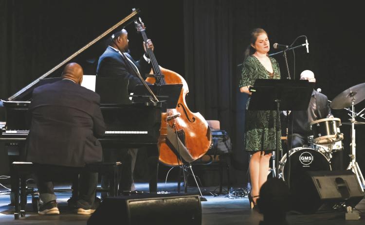 Vocalist Nicole Chillemi joined Jazz Legacy musicians (l-r) Louis Heriveaux on piano, bassist Kevin Smith, drummer and narrator Justin Varnes, and saxophonist John Sandfort (below) in presenting the music of Georgia native Johnny Mercer last week at Festival Hall in Greensboro.