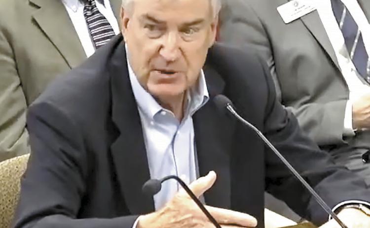 Michael Hartman speaks to members of the Energy, Utilities and Telecommunications Commission, a committee of the Georgia House of Representatives, about high bills and customer service issues with privately owned Piedmont Water Company. SCREENSHOT VIA YOUTUBE