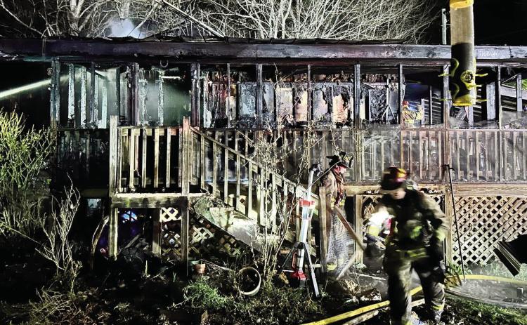 Intense flames and their aftermath depict the devastation of a mobile home fire that claimed the life of a Greene County man early last Saturday. CONTRIBUTED
