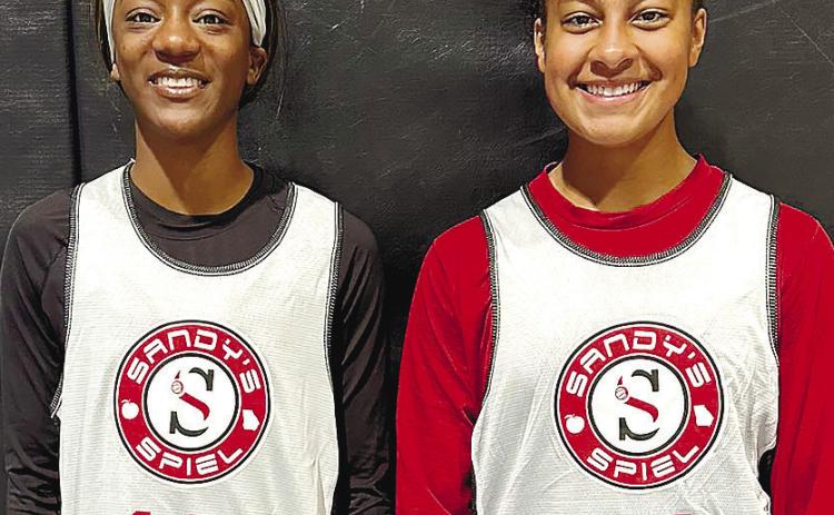 Kymora Smith (left) and Jaden Young (right) participated in a Sandy’s Spiel basketball camp this summer to further develop their skills. CONTRIBUTED
