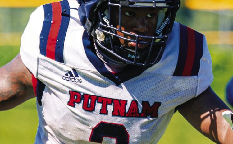 Putnam County defensive end Elijah Dunn (3) rushes the passer during the team’s padded camp in Eatonton on July 16. JCVISUALS/Contributed