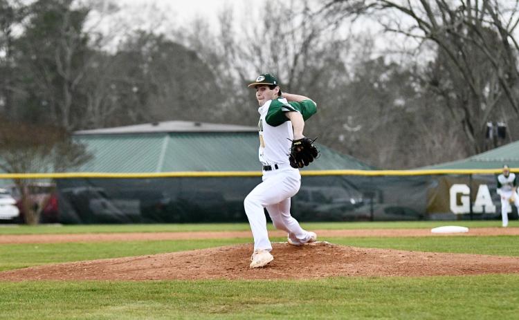 Gatewood pitcher Wilson Moore (10) winds up for a pitch on the mound in a loss to Loganville Christian Academy last week. DAWN SINCLAIR/Contributed