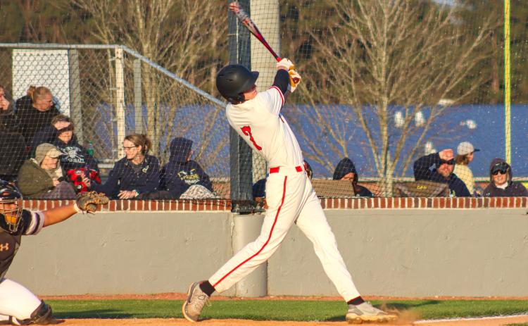 Bulldog freshman Drew Ainslie (7) slaps a line drive into right field in a loss to Apalachee last week. LANCE MCCURLEY/Staff