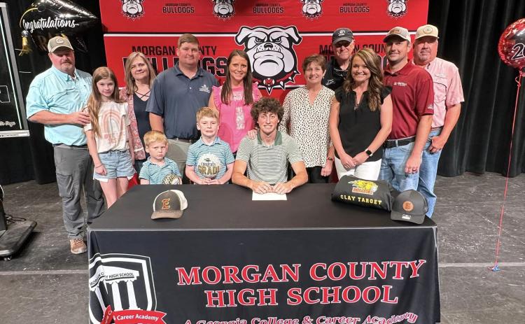 Mason Jackson recently signed his letter of intent in the Morgan County theater with friends and family there to support him. CONTRIBUTED