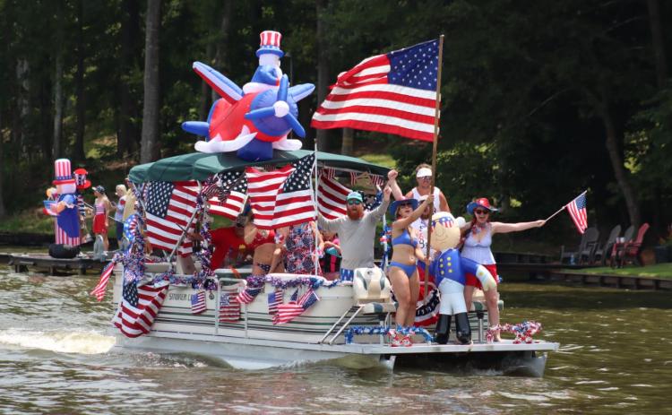 This pontoon boat, filled with a lot of patriotic pride, won the prize for the most-decorated boat. LANCE MCCURLEY/Staff