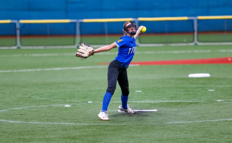 Kaitlyn Mamay delivers a pitch during the 2025 season for Lake Oconee Academy. The junior returns as the reigning Region Pitcher of the Year and will play a key role as the Titans look to make a deeper postseason run in 2026. LANCE McCURLEY/Staff
