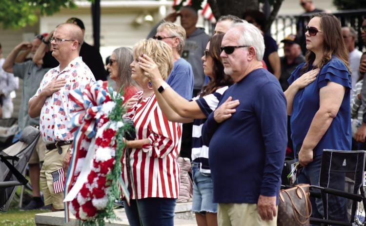 The Memorial Day event was opened by the presentation of colors. Audience members placed hands over hearts during the presentation. T. Michael Stone/Staff