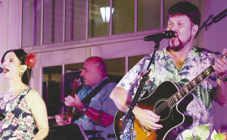 Jeff Pike, lead singer and guitarist for A1A, “The Official and Original Jimmy Buffett Tribute Show,” will bring his band’s feel-good vibes and impressive performance and stage presence to entertain crowds Sept. 23, in an outdoor concert at the Plaza Arts Center in Eatonton. CONTRIBUTED