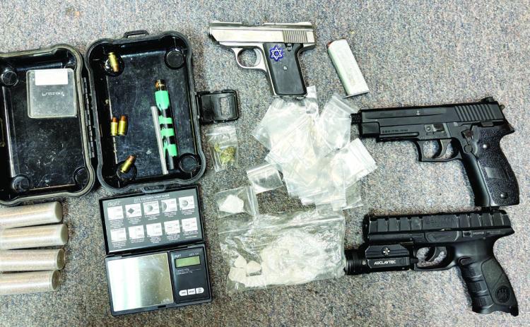 Methamphetamine packaged for distribution, scales, marijuana, two fake handguns, one real handgun and some hollow-point ammunition were seized during a recent traffic stop that led to the arrest of an Eatonton man. CONTRIBUTED/PCSO