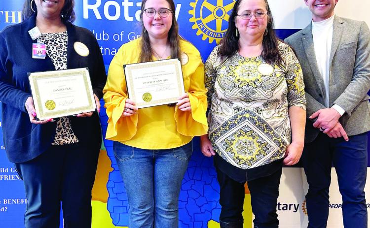 L-R: Dr. Candice Veal, Claudia Franklin,and Wanda Nix of Putnam County High School pose with Dr. Tyler Franks. CONTRIBUTED