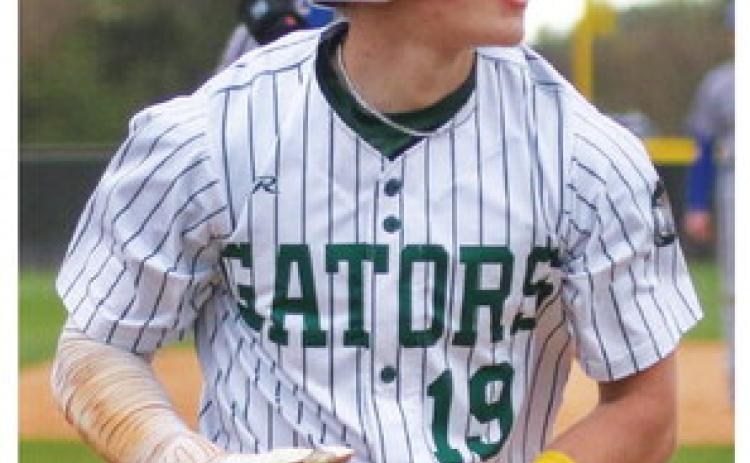 Gatewood sophomore Drew Love runs back to the dugout after he scored a run in last week’s game against CFCA. TREY NORRIS/Staff
