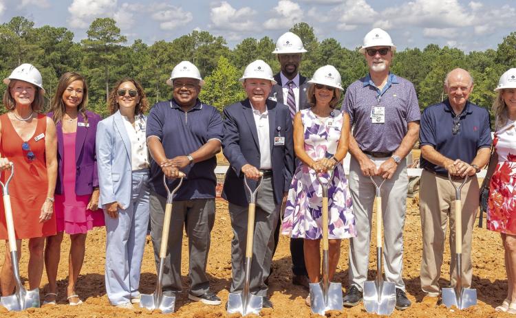 St. Mary’s and community leaders pose for a photo to celebrate breaking ground for St. Mary’s Good Samaritan Pavilion. LEIGH LOFGREN/Staff