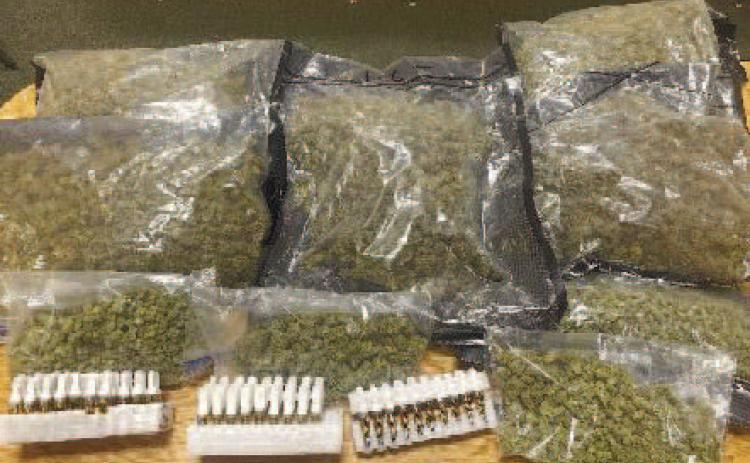 A man arrested following a traffic stop had 7 pounds of marijuana and dozens of vape cartridges containing THC in his car. CONTRIBUTED
