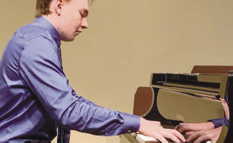 Carter Cadwallader performed at Greensboro’s Festival Hall to help raise funds for a piano purchase. CONTRIBUTED