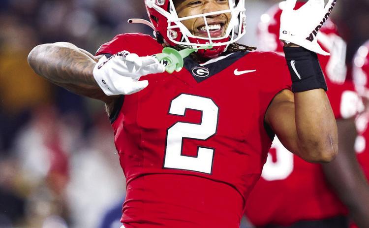 Senior running back Kendall Milton led the Bulldogs in rushing against the Yellow Jackets on 18 caries for 156 yards and two touchdowns. COURTESY OF UGA ATHLETICS