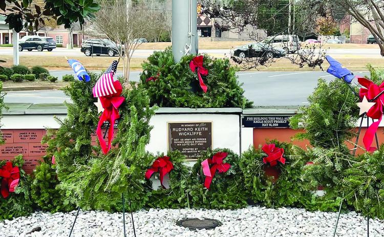 Wreaths in front of the Lake Oconee Lodge Veterans Wall.