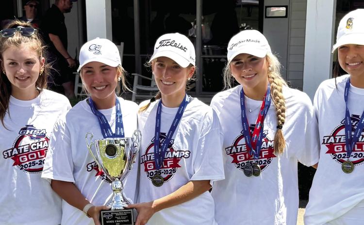 L-R: LOA girls golfers Rhys Postlmayr, Chandler Clark, Lili Nelson, Kensley Windham, Lily Dominy, Tianna Chiplock, and Ana Medrano pose for a photo after winning the GHSA Class A Division II state title. CONTRIBUTED