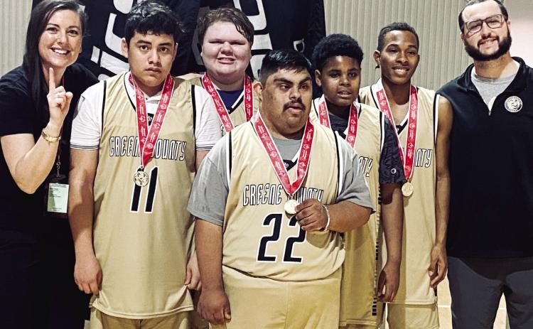 (L to R): Coach Amber Conoly with basketball players Nelson Martinez, Cassie Warwick, Luis Lucio-Gomez, Tyreese Hill, Marques Stembridge, and assistant coach Brad Evans. CONTRIBUTED