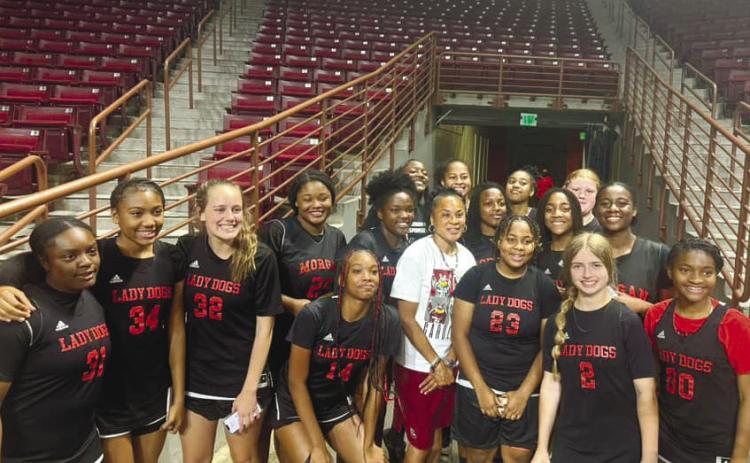 The Lady Bulldogs with South Carolina women’s basketball coach Dawn Staley after attending her camp last week. CONTRIBUTED