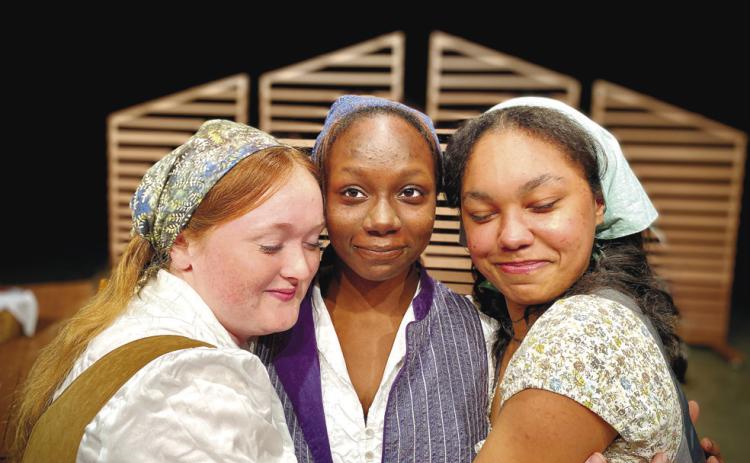 Tevye’s daughters Chava (Emma Jo Parham), Tzeitel (Camiyah Jones), and Hodel (Nevaeh Marshall) sing of their hopes and fears of being matched with a husband in the song “Matchmaker, Matchmaker.” CONTRIBUTED