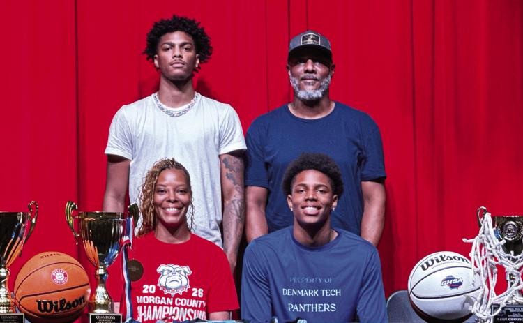 Kobi Jefferies (front row, right) recently signed to continue his basketball career at Denmark Technical College. CONTRIBUTED