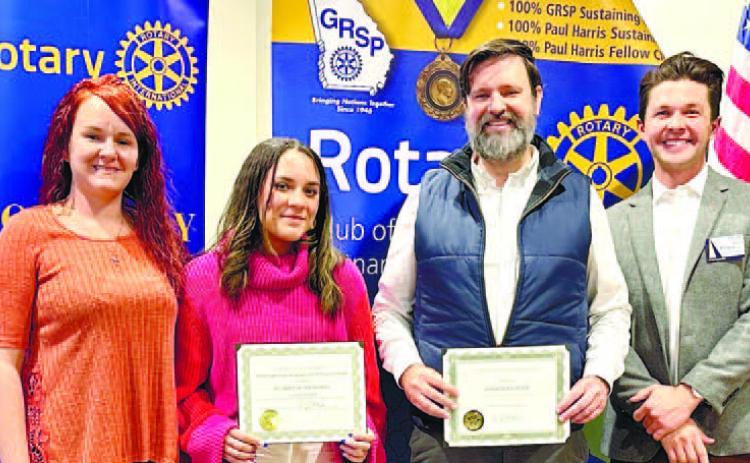 Nicki Fowler, Jaida Jackson, and Jonathan Deen of Putnam County High School pose with Rotarian Dr. Tyler Franks. CONTRIBUTED