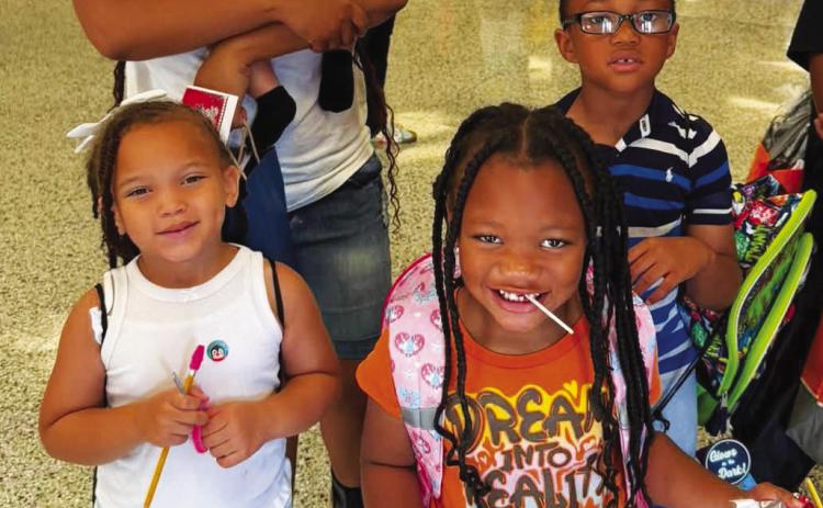 Happy families enjoyed the Reach 2 Teach Back-to-School Bash and Community Health Fair, held last Saturday at Putnam County Elementary School. CONTRIBUTED