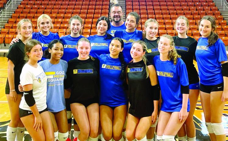 Lake Oconee Academy volleyball poses for a team photo during its three-day intensive camp at Mercer University in Macon. The Titans used the camp as an opportunity to prepare for the 2026 season while continuing to build chemistry, communication and team culture. CONTRIBUTED