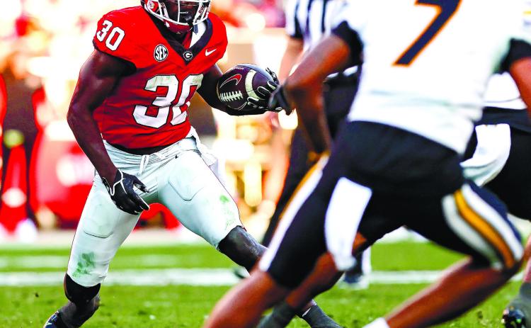 Daijun Edwards (30) rushed for 77 yards on 16 attempts last week in Georgia’s win over Missouri. TONY WALSH/UGA Athletics